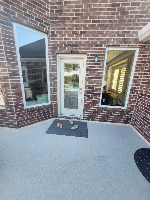 Brick home patio windows