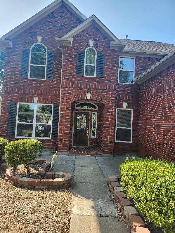 Brick home with arched windows